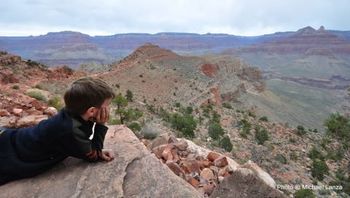 Michael Lanza's nine-year-old son, Nate, contemplates their 3,000-foot climb up the South Kaibab Trail on the last day of their 29-mile backpacking trip in the Grand Canyon.