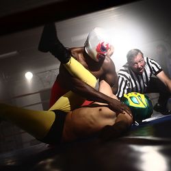 Bigstock_Masked_wrestlers_and_referee_i_24830204