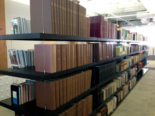 Floating bookshelves make a modern new home for Beacon's historic library.