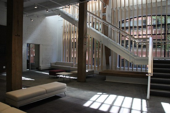 The reception area and grand stair at the UUA’s new headquarters at 24 Farnsworth Street (© Dea Brayden/UUA)