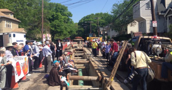 Sixteen interfaith clergy about to be arrested to #StopSpectra