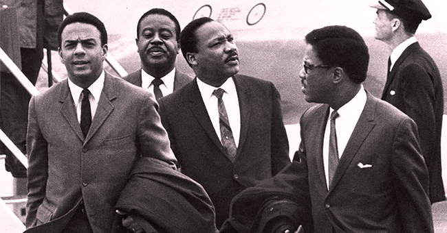Martin Luther King, Jr. arrives at the Memphis airport with aides (l to r) Andrew Young, Ralph Abernathy, and Bernard Lee.