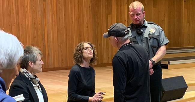 Robin Robin DiAngelo in Bend, Oregon, with security.