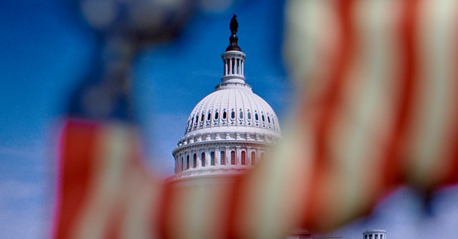 View of Capitol Hill through shorn flag