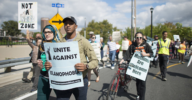 200 people gathered in east Minneapolis, MN, for a rally and march to to denounce hate speech and hate crimes against Muslims, September 17, 2016.