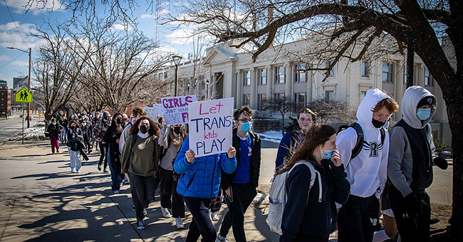 Students at Central Academy walking out of school over the noon hour and marching to the Governor’s mansion to protest a new anti-transgender law on 11 March 2022 in Des Moines, IA. Photo credit: Phil Roeder